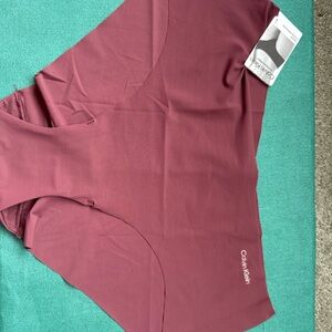 Brand NEW Calvin Klein seamless bikini underwear in a beautiful wine red color.